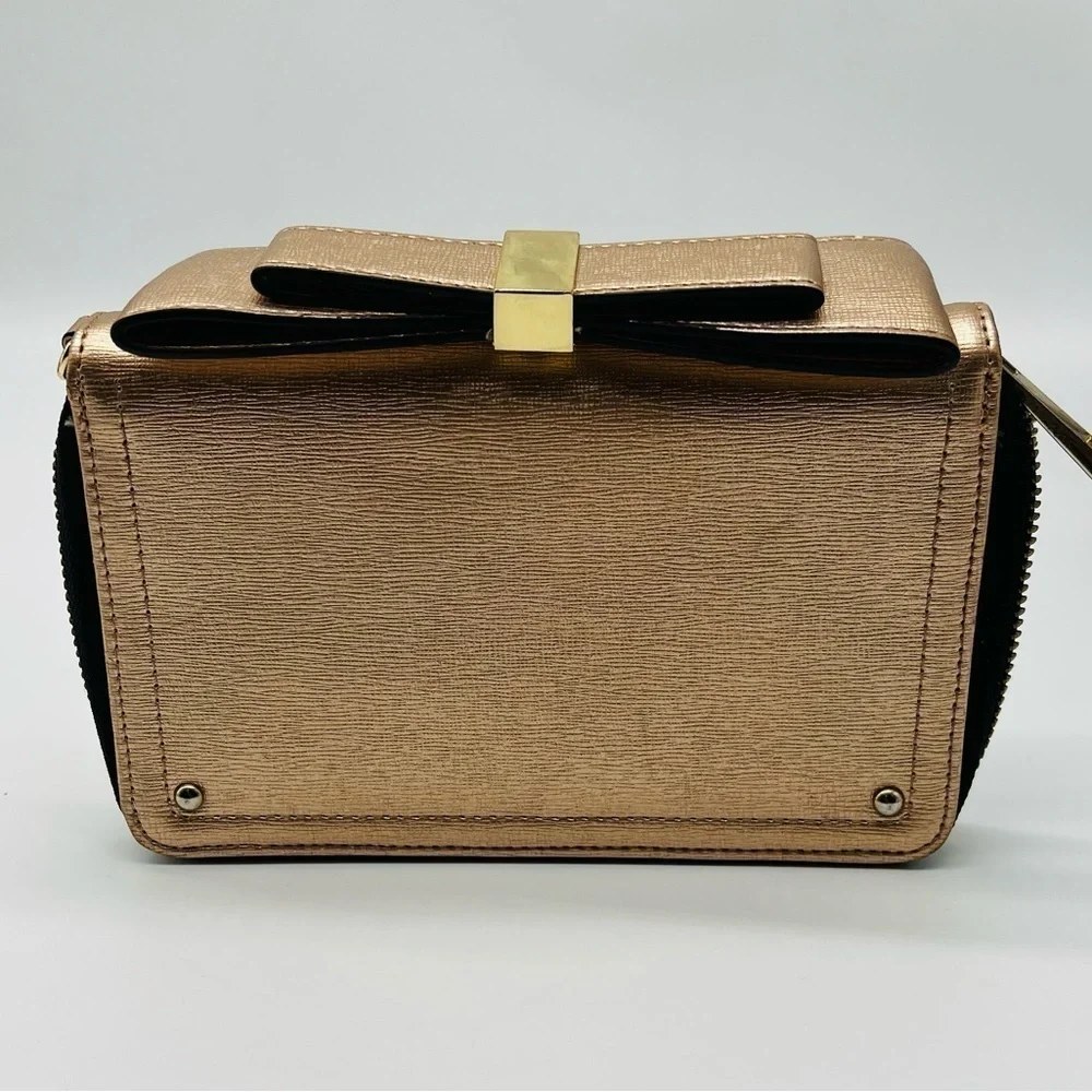 Aldo rose gold wallet with top bow